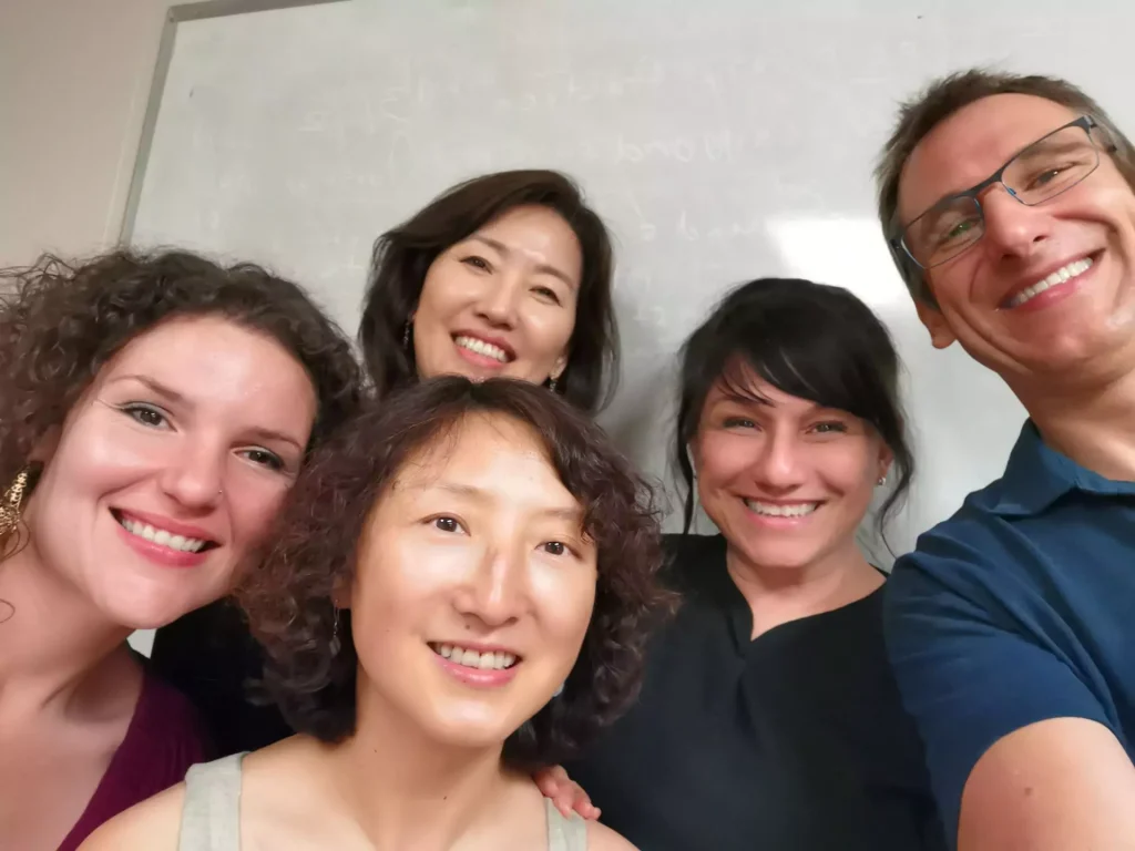 Students participating in small group American English pronunciation class