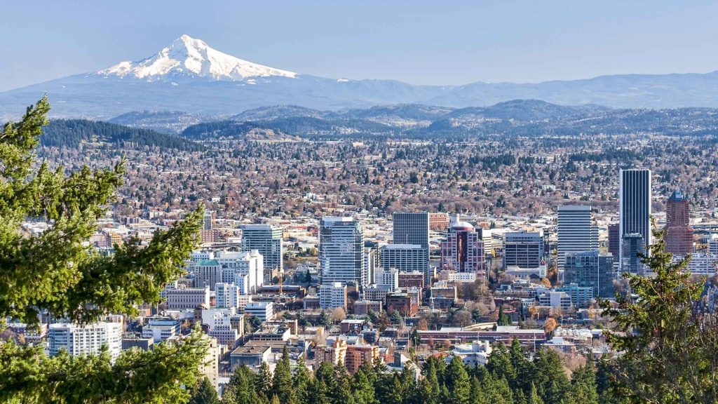 Portland, Oregon skyline with Mount Hood in the background, representing local accent reduction and communication training services.