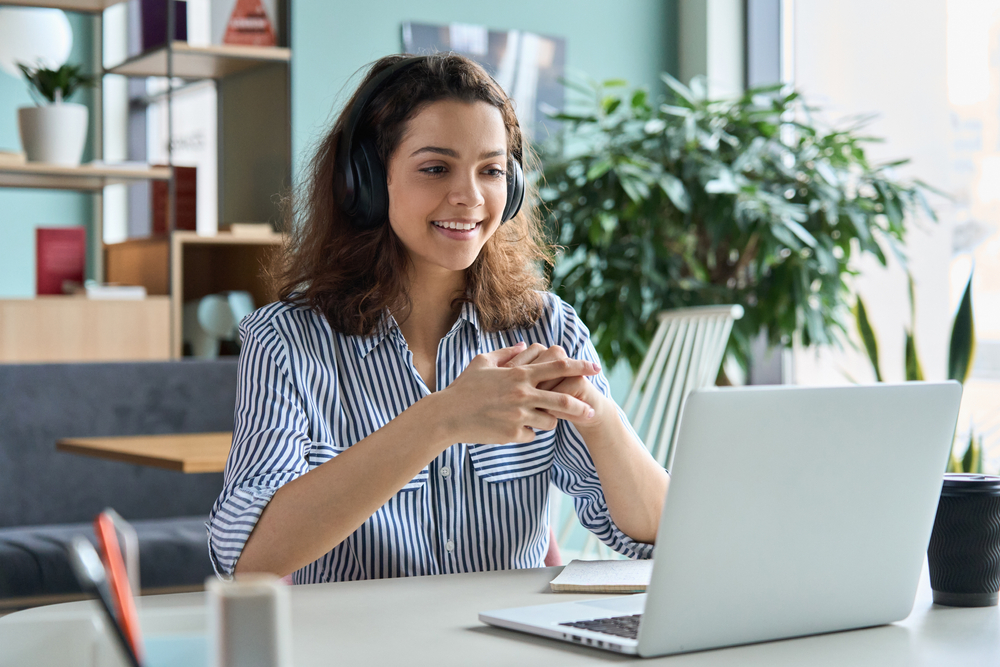 Adult professional attending an online accent modification class to improve English pronunciation and communication skills