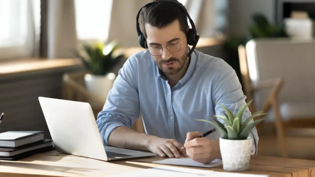 Man practicing American English pronunciation during an online accent training session.